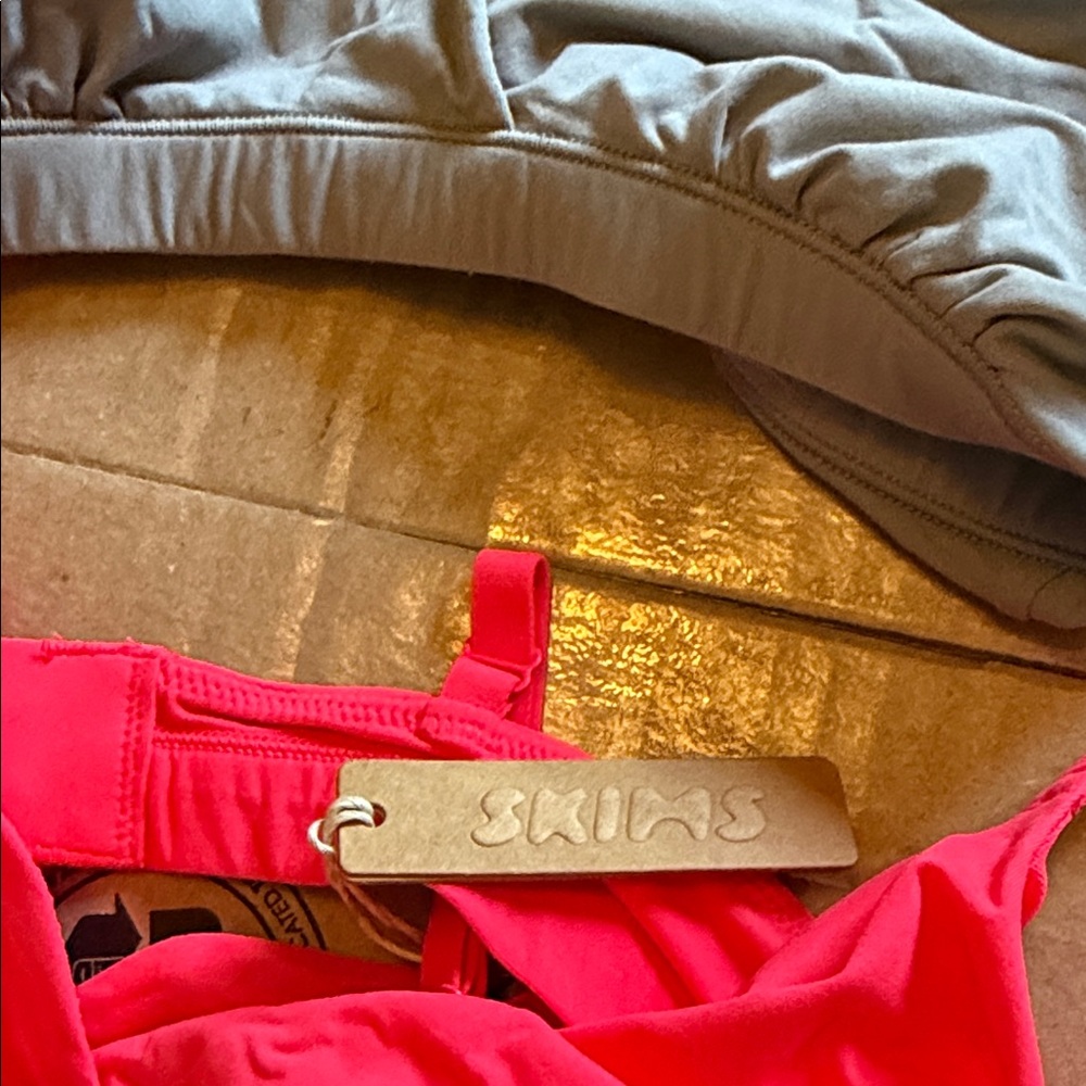 SKIMS Women's Gray and Pink bras. One is new with tags size medium never worn. - Picture 3 of 3